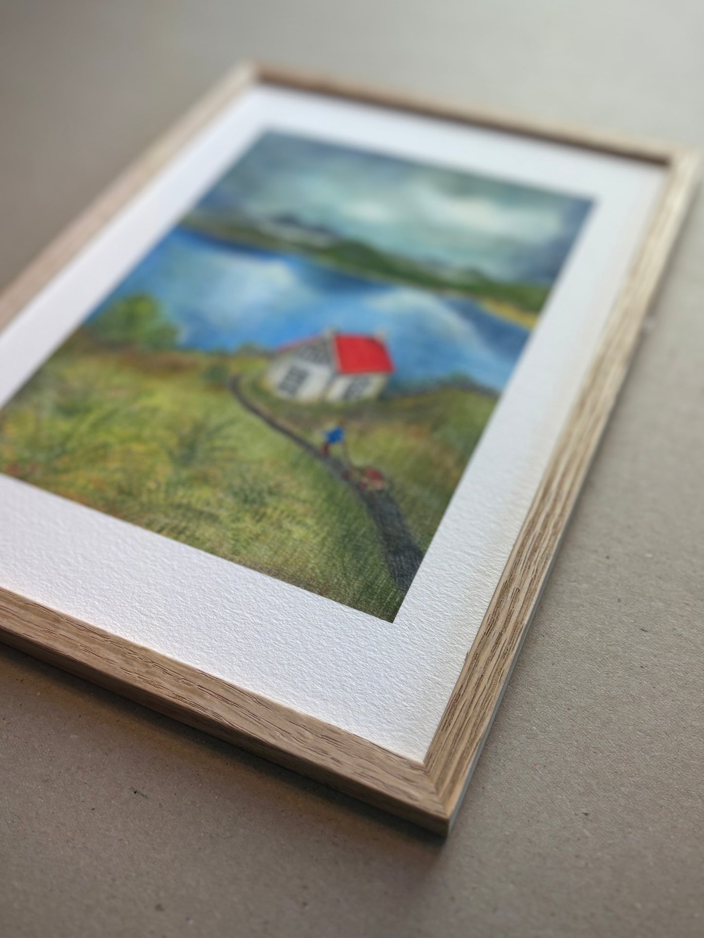 A4 Kunstdruck "kleines Haus am Wasser" mit Rahmen Eiche