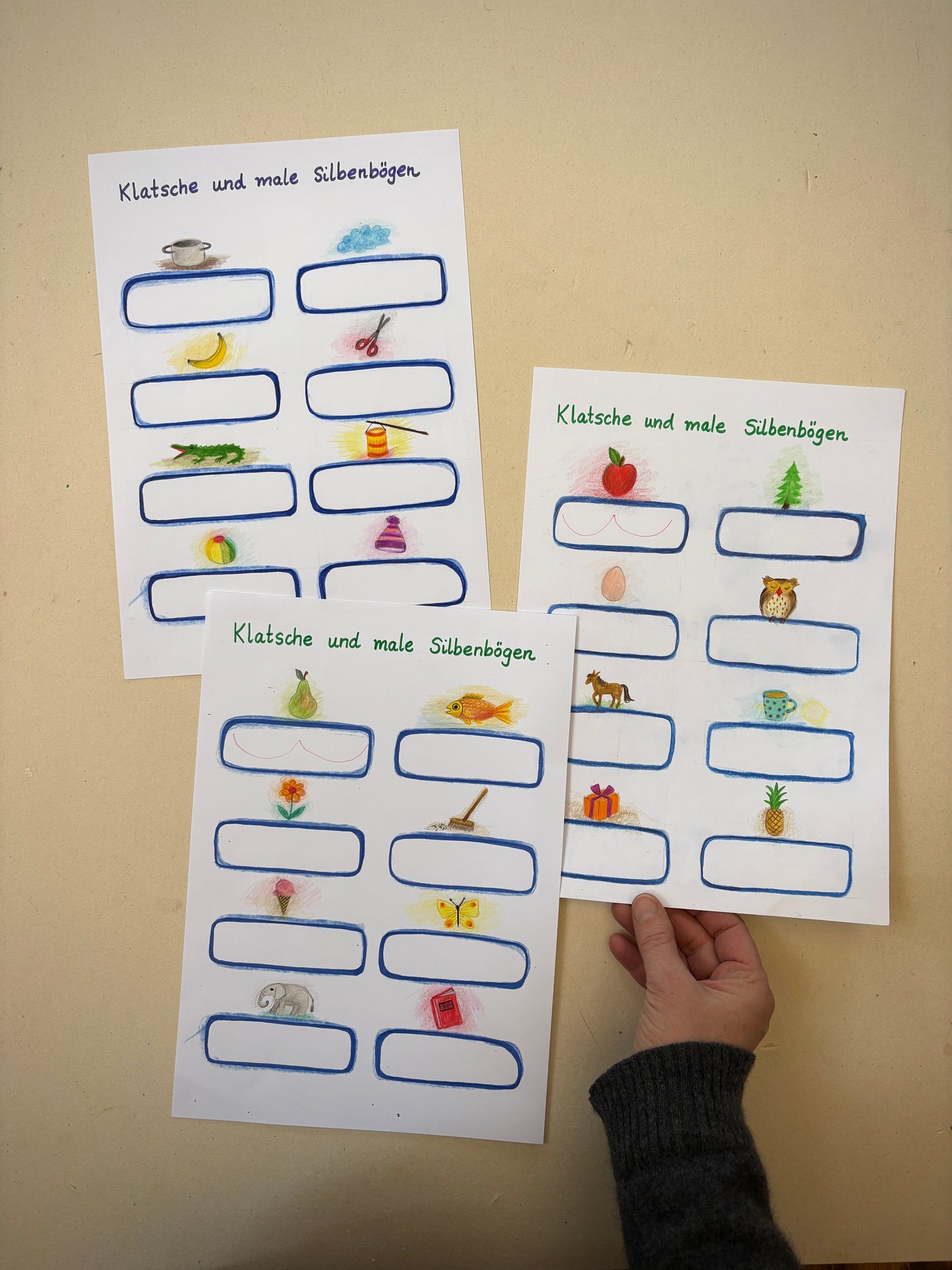 Klatsche und male Silbenbögen 1, 3 Arbeitsblätter (PDF)