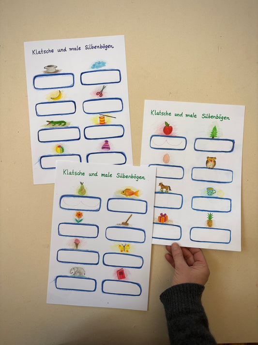 Klatsche und male Silbenbögen 1, 3 Arbeitsblätter (PDF)